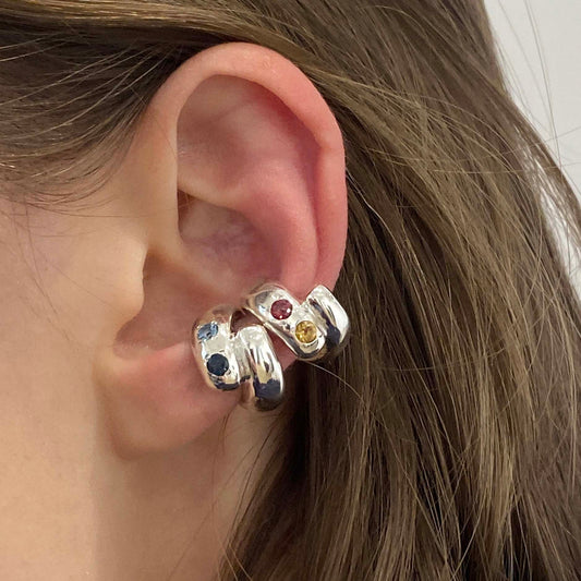 Daras Space. Bold Swirl Ear Cuff with Blue Topaz