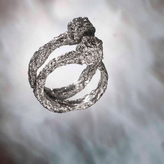 Unique foil ring. On background. Daras Space