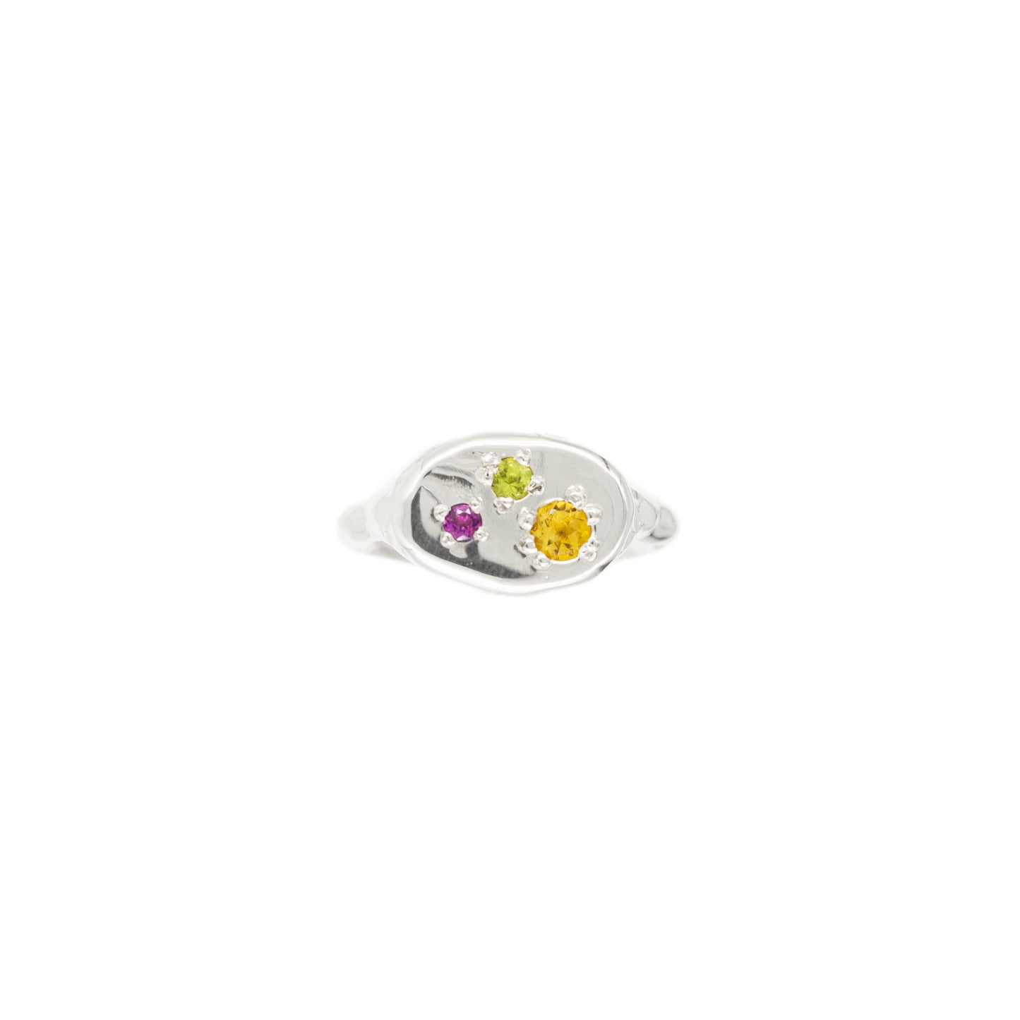 Handmade archaic silver ring with rhodolite, citrine and peridot. Close up