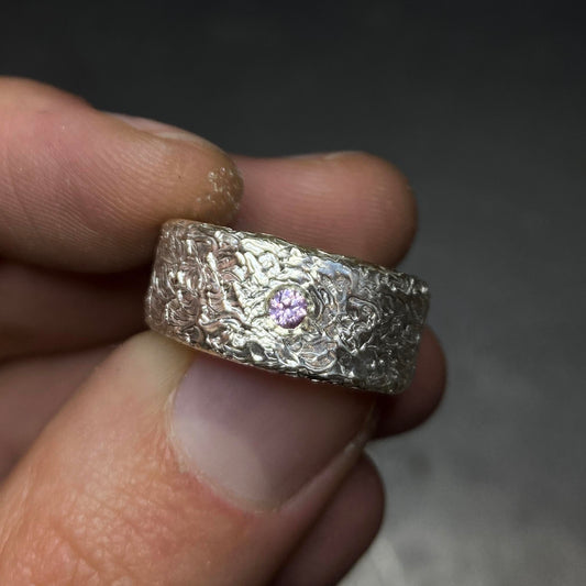 Silver ring with a light pink sapphire gemstone. Daras Space