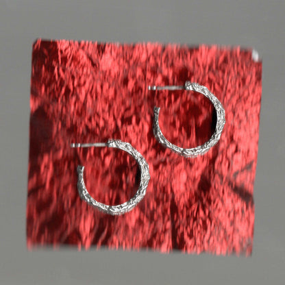 Textured foil earrings in sterling silver. Daras Space