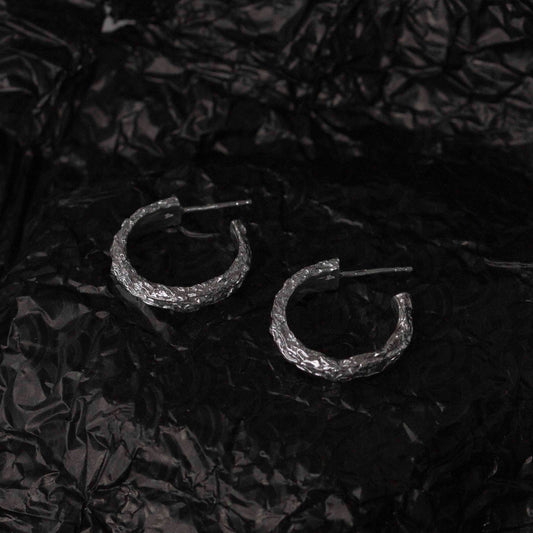 Textured foil earrings in sterling silver. Daras Space