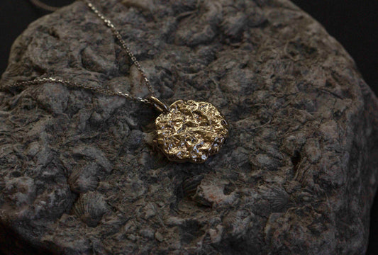 Daras Space. Sand Casted White Gold Foil Pendant