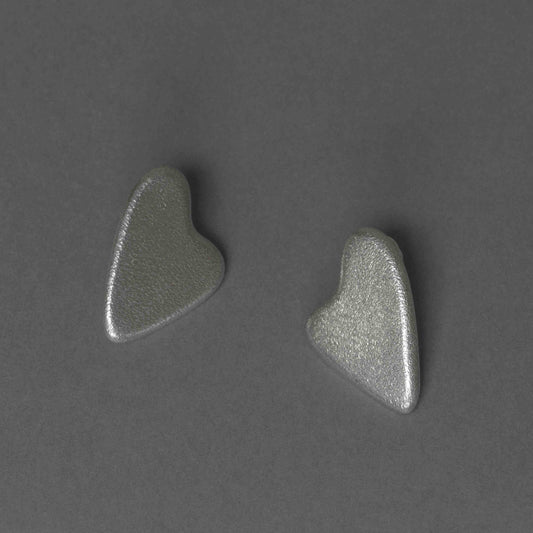 Handmade unique textured heart earrings.