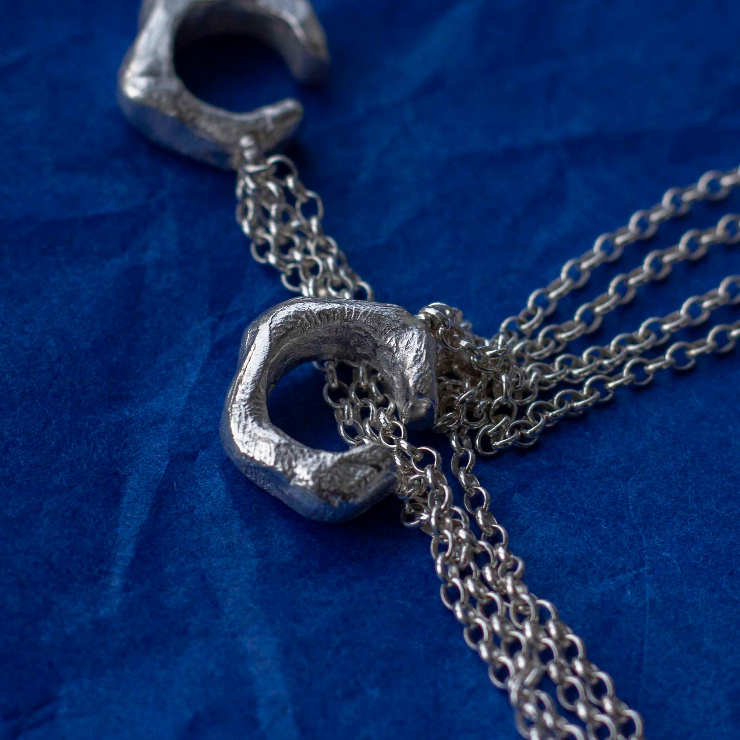 close up cascade comet ear cuff 