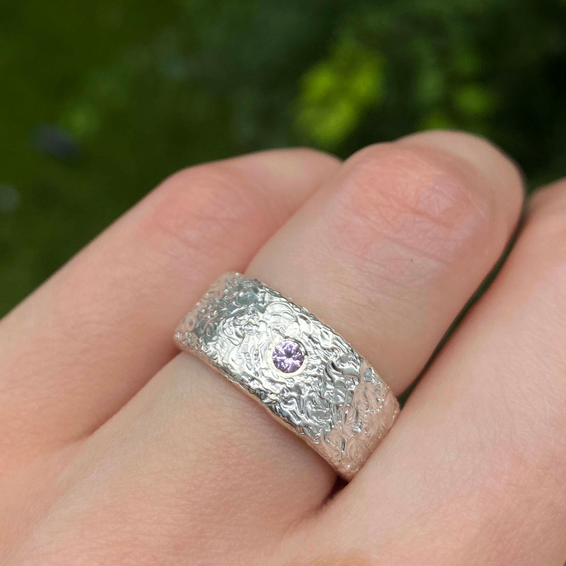 Silver ring with a light pink sapphire gemstone