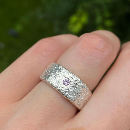 Silver ring with a light pink sapphire gemstone