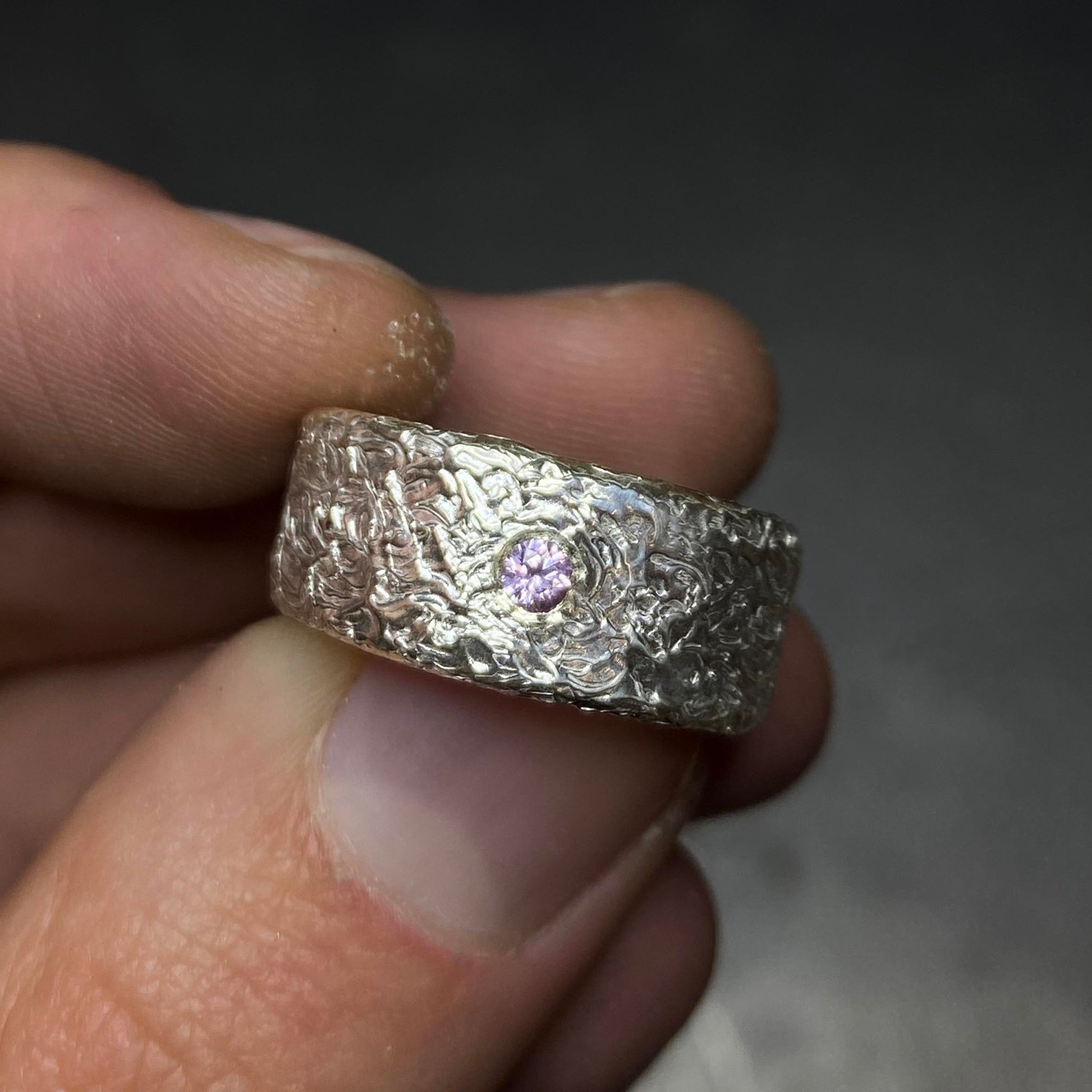Silver ring with a light pink sapphire gemstone. Daras Space